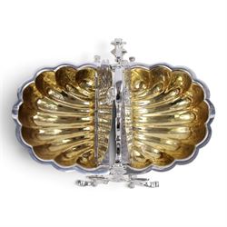 Silver-plated Victorian style biscuit box, in a shell form with engraved leaf detailing, upon scroll feet, H24cm