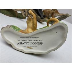 Ten Franklin Mint National wildlife Foundation Big Cats of the World figures to include, White Bengal Tiger, Jaguar, Cougar, Cheetah, Clouded Leopard etc, with display stand