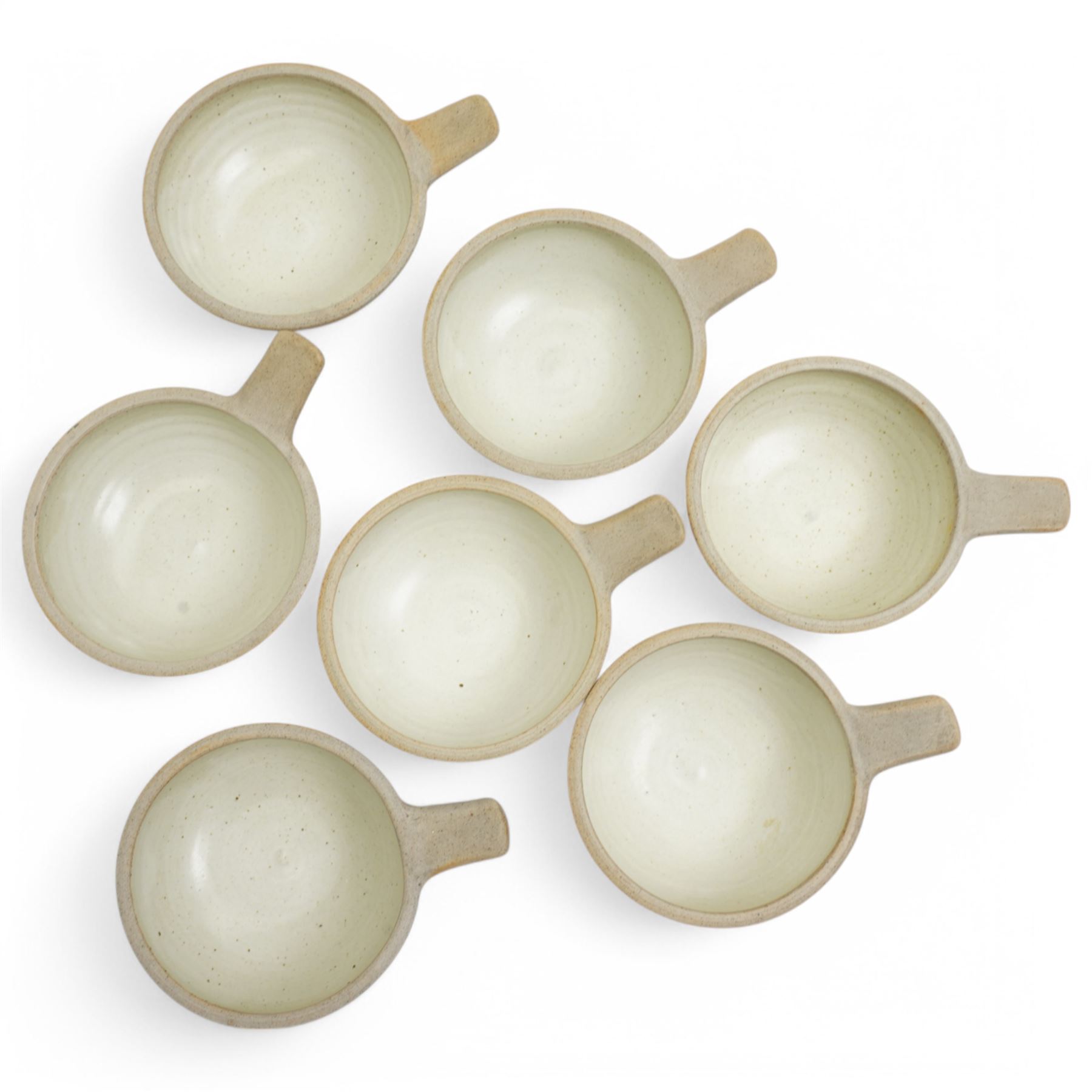 Set of seven Winchcombe studio pottery soup bowls, with impressed marks to bases, D17cm including handles