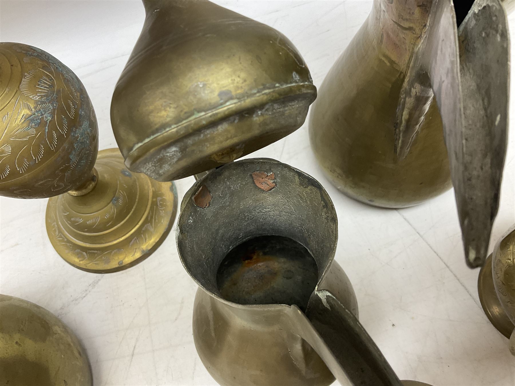 Two brass hookah pipes, and quantity of brass Arabic Dallah coffee pots and other brassware