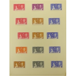  'The New Ideal Postage Stamp Album' containing various stamps issued to commemorate the Coronation of King George VI, May 12th 1937 together with a small number of stamps relating to the coronation of Queen Elizabeth II 2nd June 1953  
