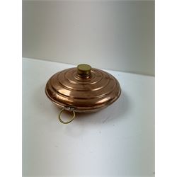 Seven 19th century and later copper hot water bottles