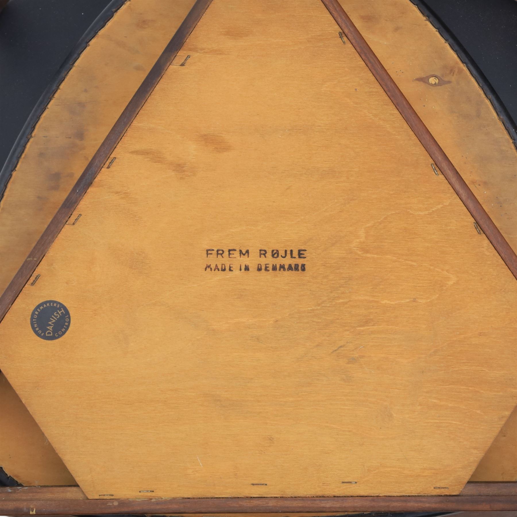 Frem Røjle - Danish teak 'Roundette' extendable dining table, circular top with softly chamfered edge and internal stowable leaf extends to 156cm, raised on four tapered cylindrical legs, accompanied by four matching dining chairs with shaped teak frames and black vinyl upholstered seats, the chairs designed to nest beneath the table when not in use