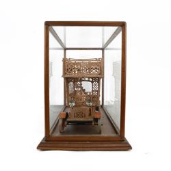 Early 20th century fretwork model of an omnibus, contained within glazed wooden case, case H45cm