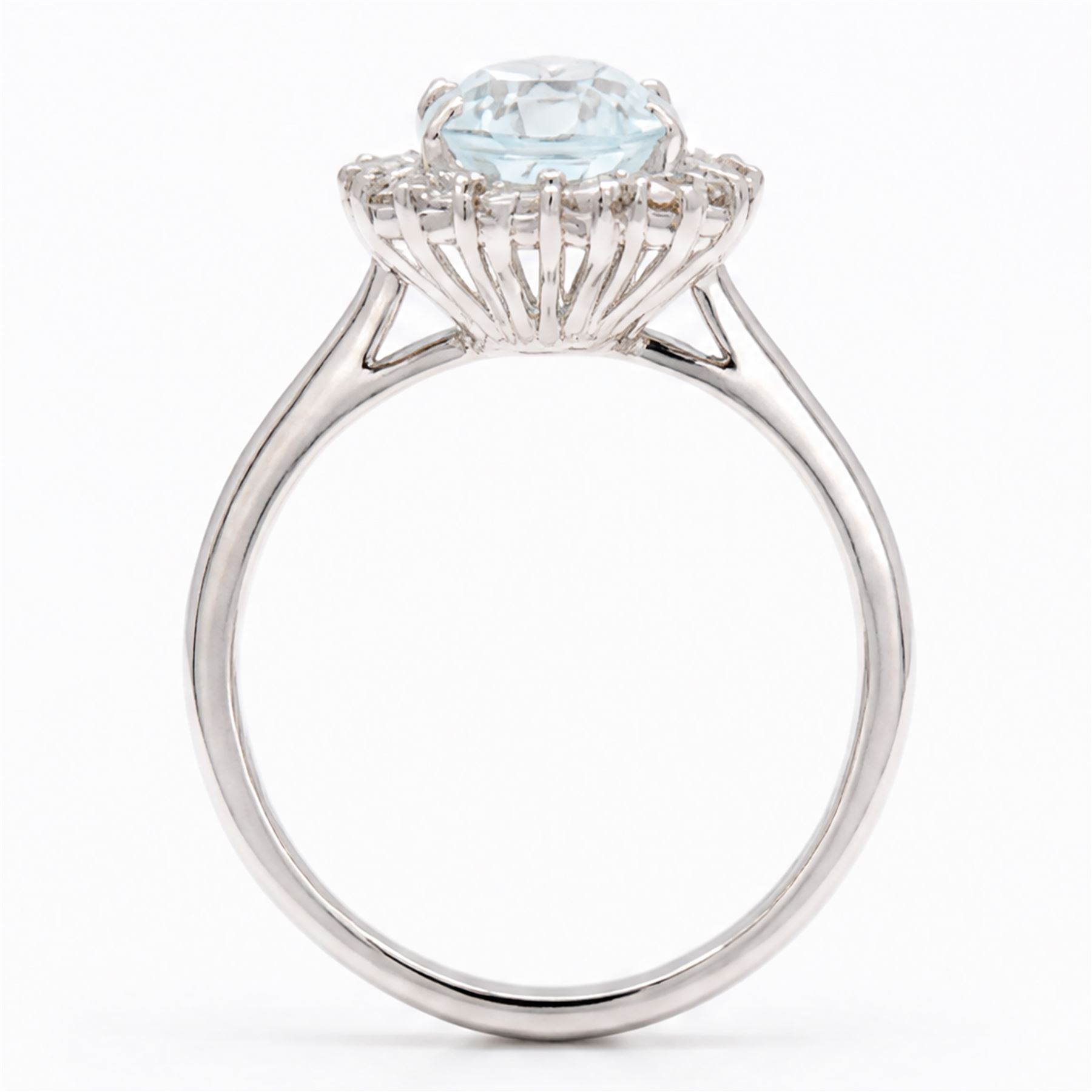 18ct white gold aquamarine and diamond cluster ring, single oval cut aquamarine of approx 1.95 carat, surrounded by fourteen round brilliant cut diamonds, London 2022, total diamond weight approx 0.50 carat