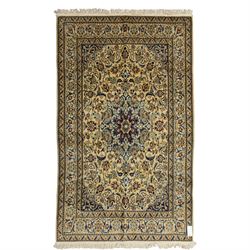 Central Persian fine Nain hand-knotted rug, ivory ground, with a central shaped floral med...