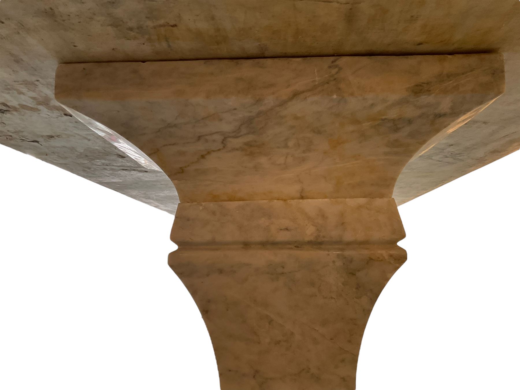 Classical Grecian design Carrera marble centre table, the rectangular single slab top with rounded corners and carved edge, raised on twin pedestals comprised of three pieces with a waisted column on a stepped plinth