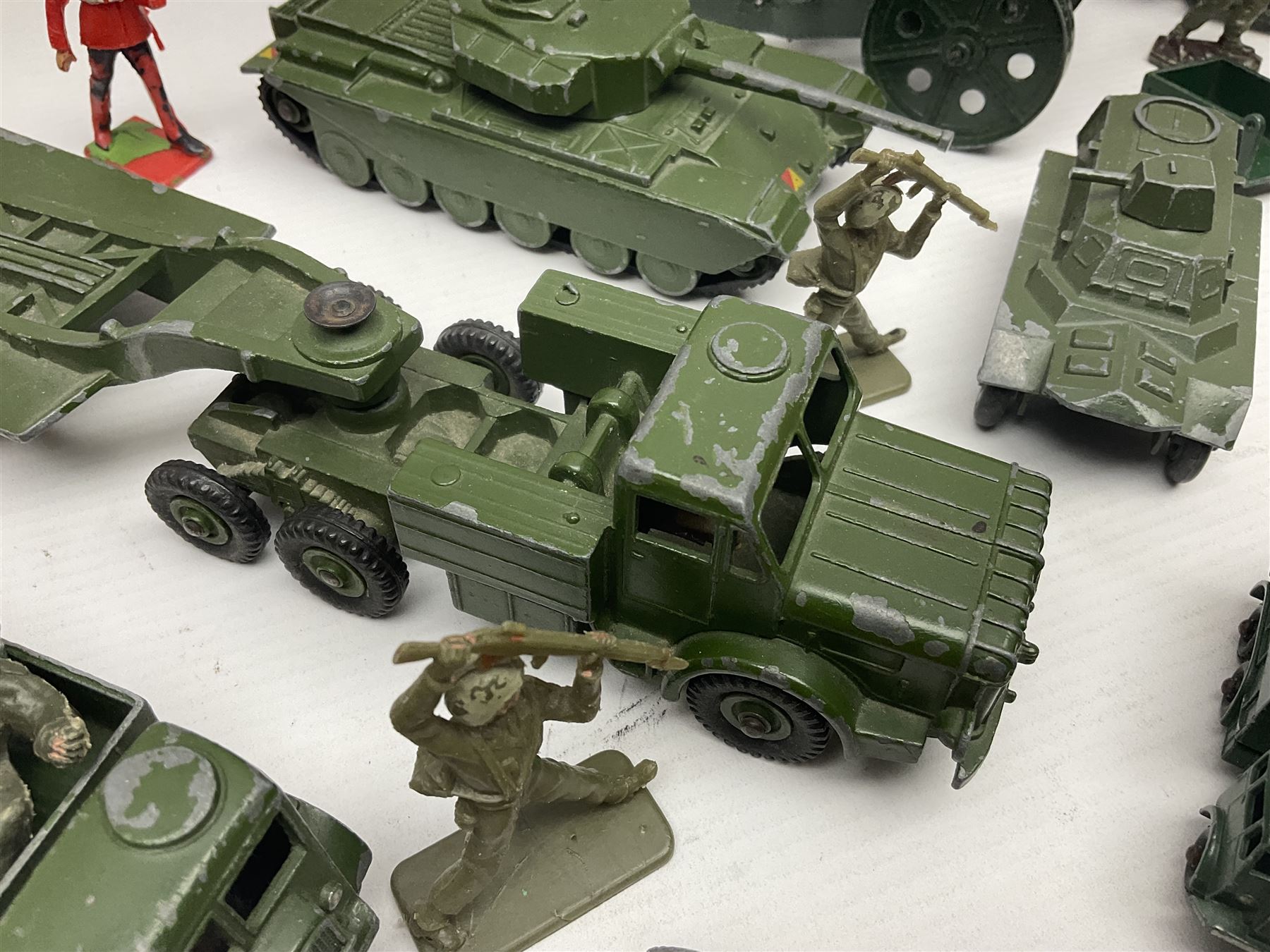 Various makers - unboxed and playworn die-cast models including Dinky Thornycroft Mighty Antar Tank Transporter No.660 and Centurion Tank No.651, other military and farm vehicles; and quantity of loose plastic soldiers and other figures by Crescent, Britains etc