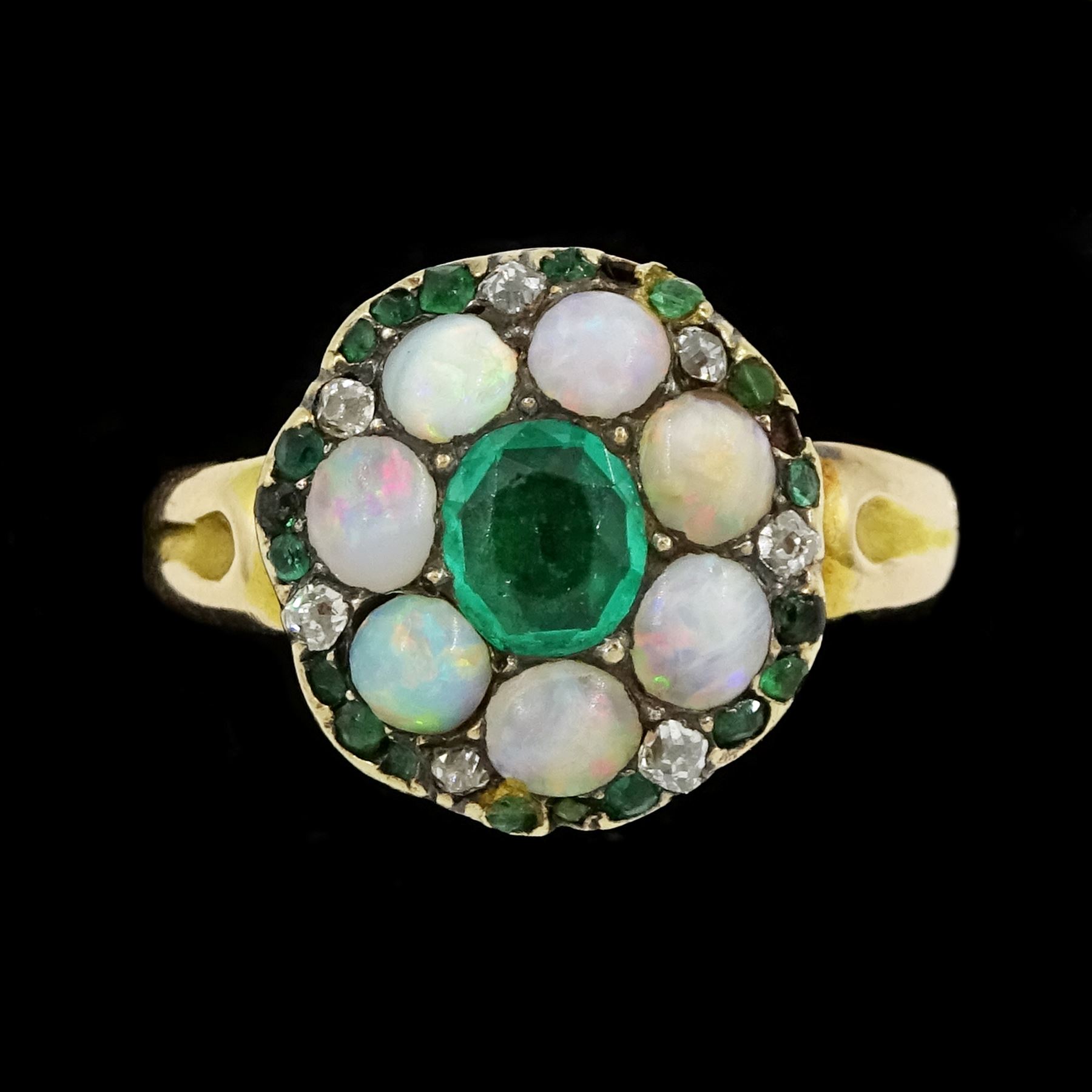 19th century 14ct gold emerald, opal and old cut diamond cluster ring, the principal oval cut emerald, with opal, diamond and emerald surround