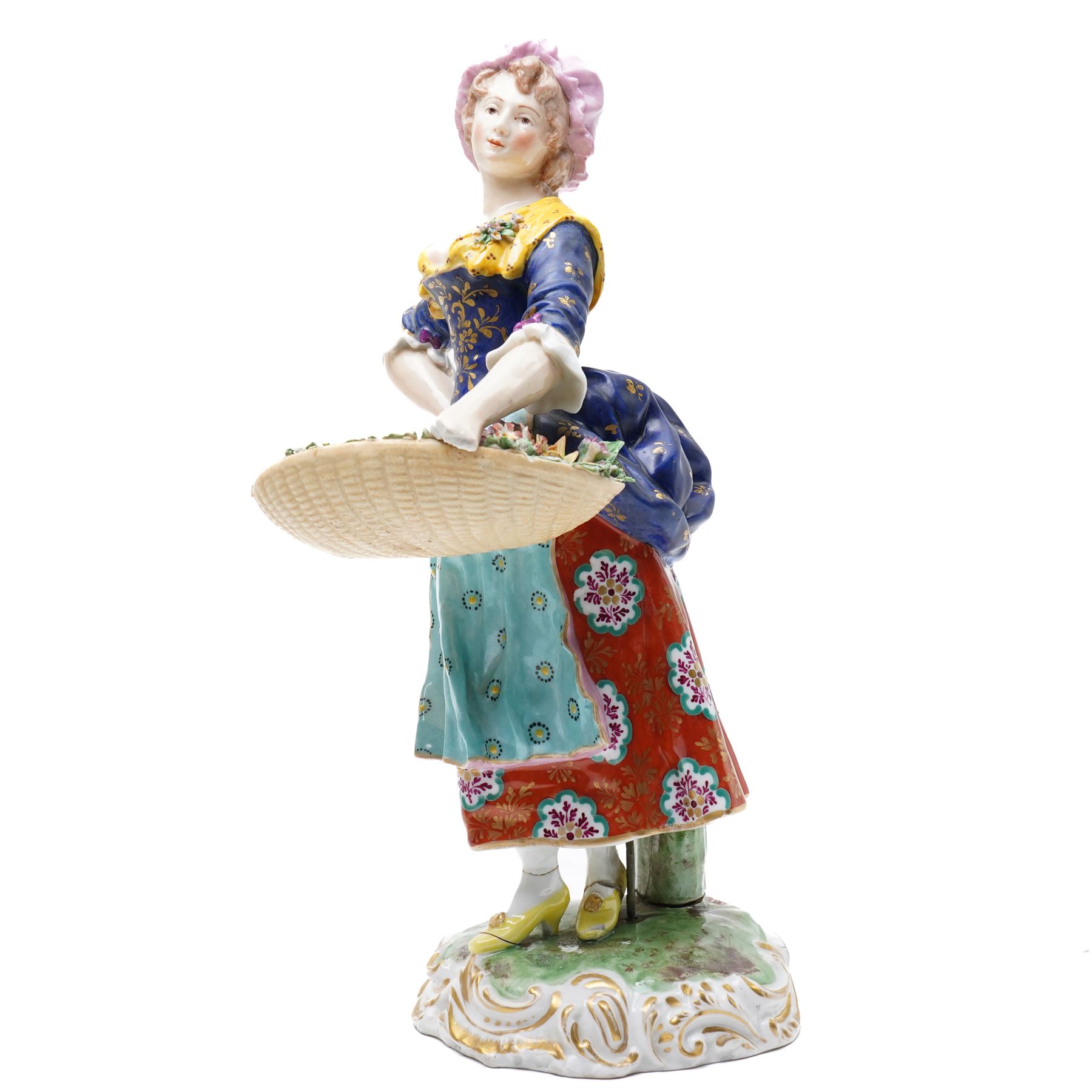 Pair of 19th century Samson of Paris figures of male and female itinerant milliners, each holding a basket with ribbons and flowers on rococo style gilt bases H33cm