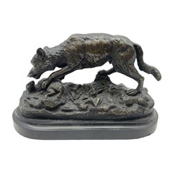 Bronze figure of a wolf with lamb prey, L18cm