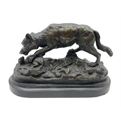 Bronze figure of a wolf with lamb prey, 
