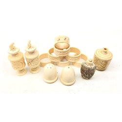  Two pairs of early 20th century ivory salt & pepper shakers, set of six similar age Chinese ivory napkin rings, Chinese bone snuff bottle, thread holder etc (13)   