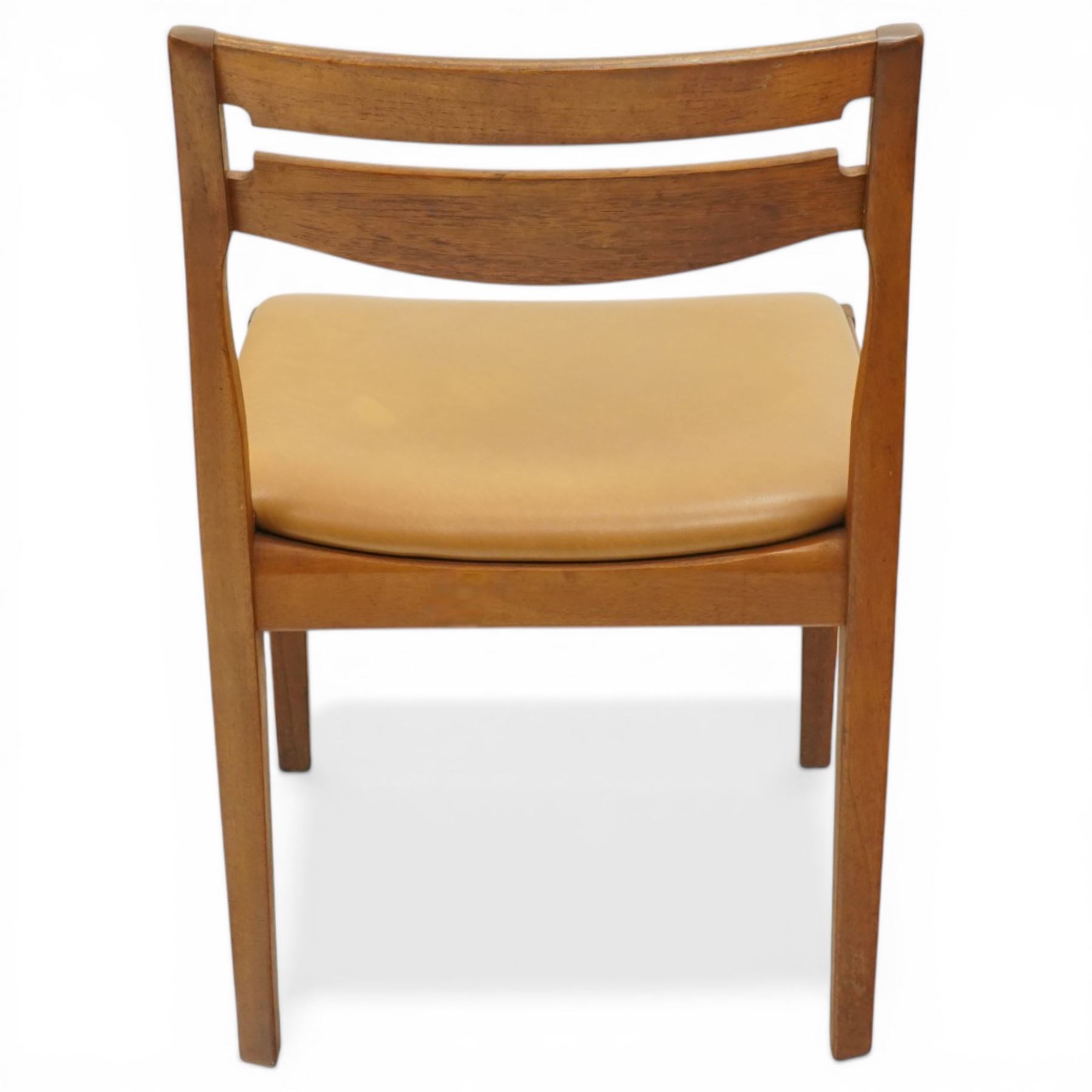 Nathan - teak oval extending dining table, together with set of eight matching low-back dining chairs with tan leather seats, extends to 203cm