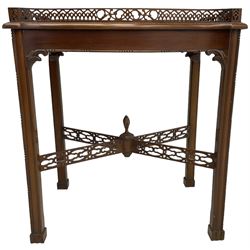 Georgian design mahogany silver table, fretwork gallery tray top, on square moulded supports united by fretwork x-framed stretcher 