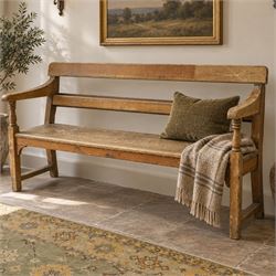 Early 20th century pine chapel bench, with moulded plank back rail over plain rail, with b...