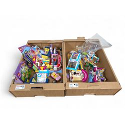 Collection of Lego Friends buildings, built with instructions, including High School, Crui...