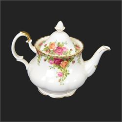Royal Albert Country Roses tea and dinner service for six place settings, comprising teapot, milk jug, cups and saucers, dessert plates, side plates and dinner plates, all with printed mark beneath 