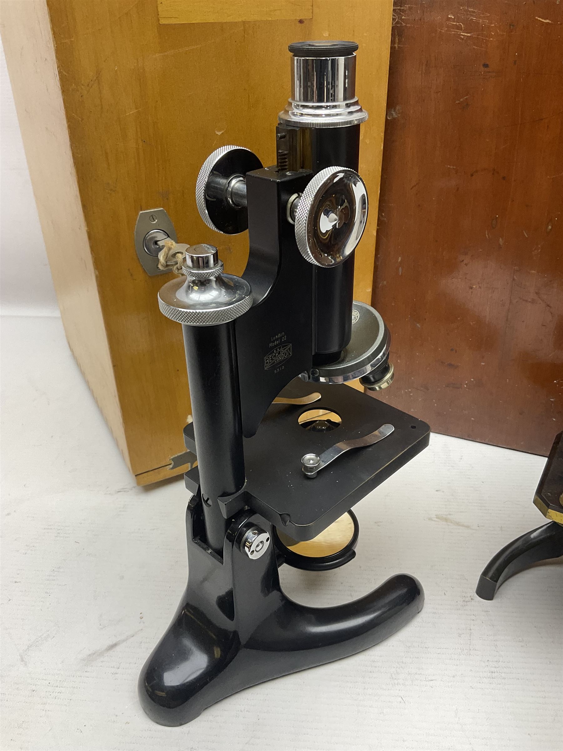 Three microscopes, comprising Swift and Son, Beck model 22 no 5512 amd E. Leitz Wetzlar no 113555, all boxed