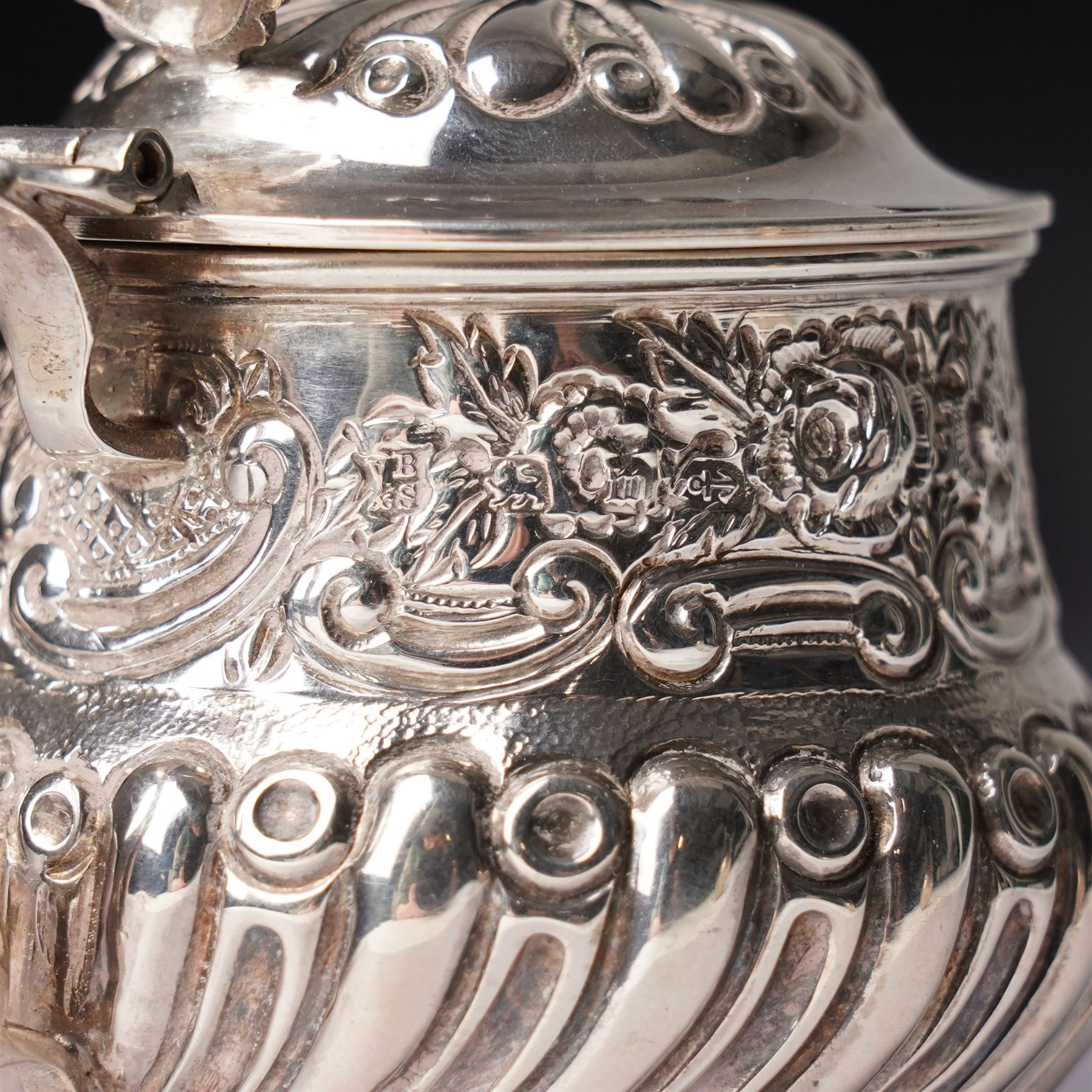 Victorian Scottish silver toddy ladle, the bowl inset with a Victorian shilling coin and with twisted whale bone handle Glasgow 1850 Maker Blaikley & Good, embossed silver drum mustard pot and and an oval mustard pot Sheffield 1902 (3)