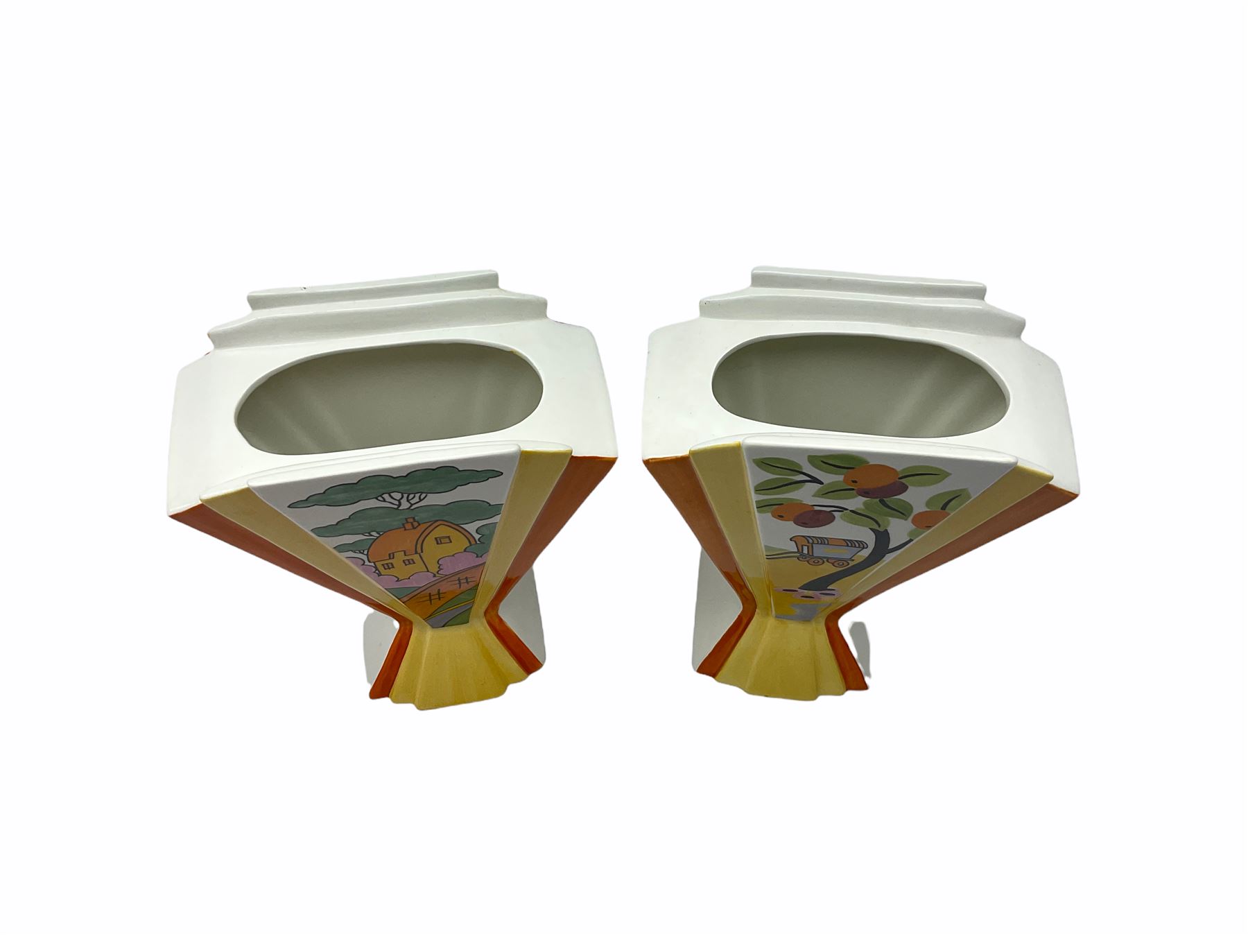 Two Wedgwood Clarice Cliff sunray vases, in Caravan design and Orange Roof Cottage design, both limited edition, H21.5cm. 