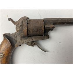 19th century 7mm five-shot pin-fire revolver, the cylinder marked 'The Savety (sic) American Revolver 1879', with folding trigger and two-piece walnut grip L18cm
