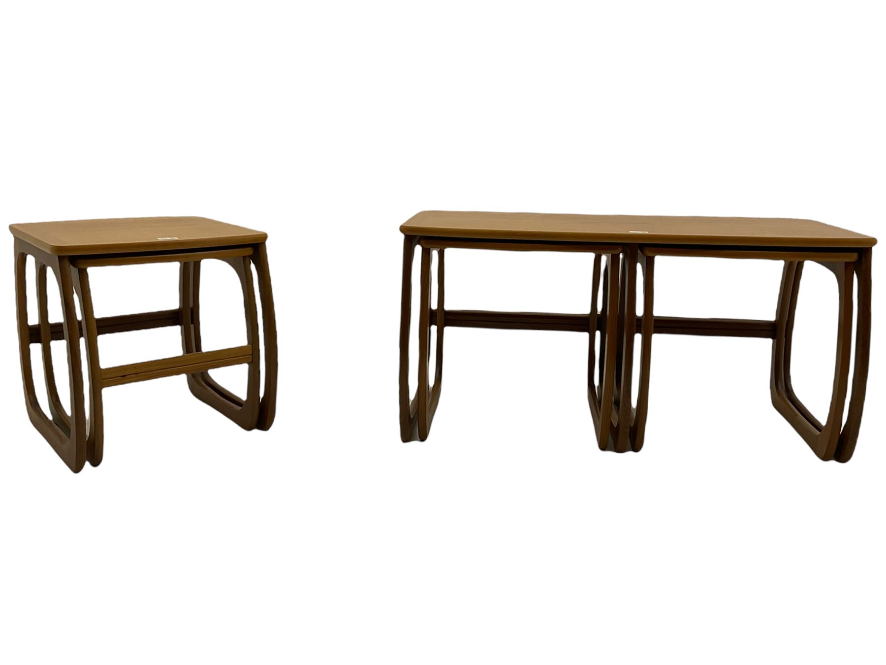 Nathan - teak Long John nest of tables and a singular nest of tables 