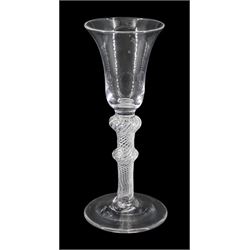 18th century drinking glass, the bell shaped bowl upon a single series air twist double knopped stem and conical foot, H15cm