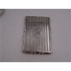 Edwardian silver card case, of rectangular form with shaped outer edge and engine turned linear decoration to body, with central monogrammed circular cartouche, H9.2cm, hallmarked Deakin & Francis Ltd, Birmingham 1903, together with a 1920s silver jewellery box, of plain oval drum form, engraved 'May' to hinged cover, opening to reveal part silk lined interior, upon four pad feet, H4.5cm, hallmarked J & R Griffin Ltd, Chester 1922 and a 1930s silver box, of circular form, engraved with monogram to hinged cover, hallmarked Barker Brothers Silver Ltd, Birmingham 1932