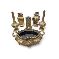 Brass twin handled planter, pair of pierced brass bottle neck vases and three other brass vases