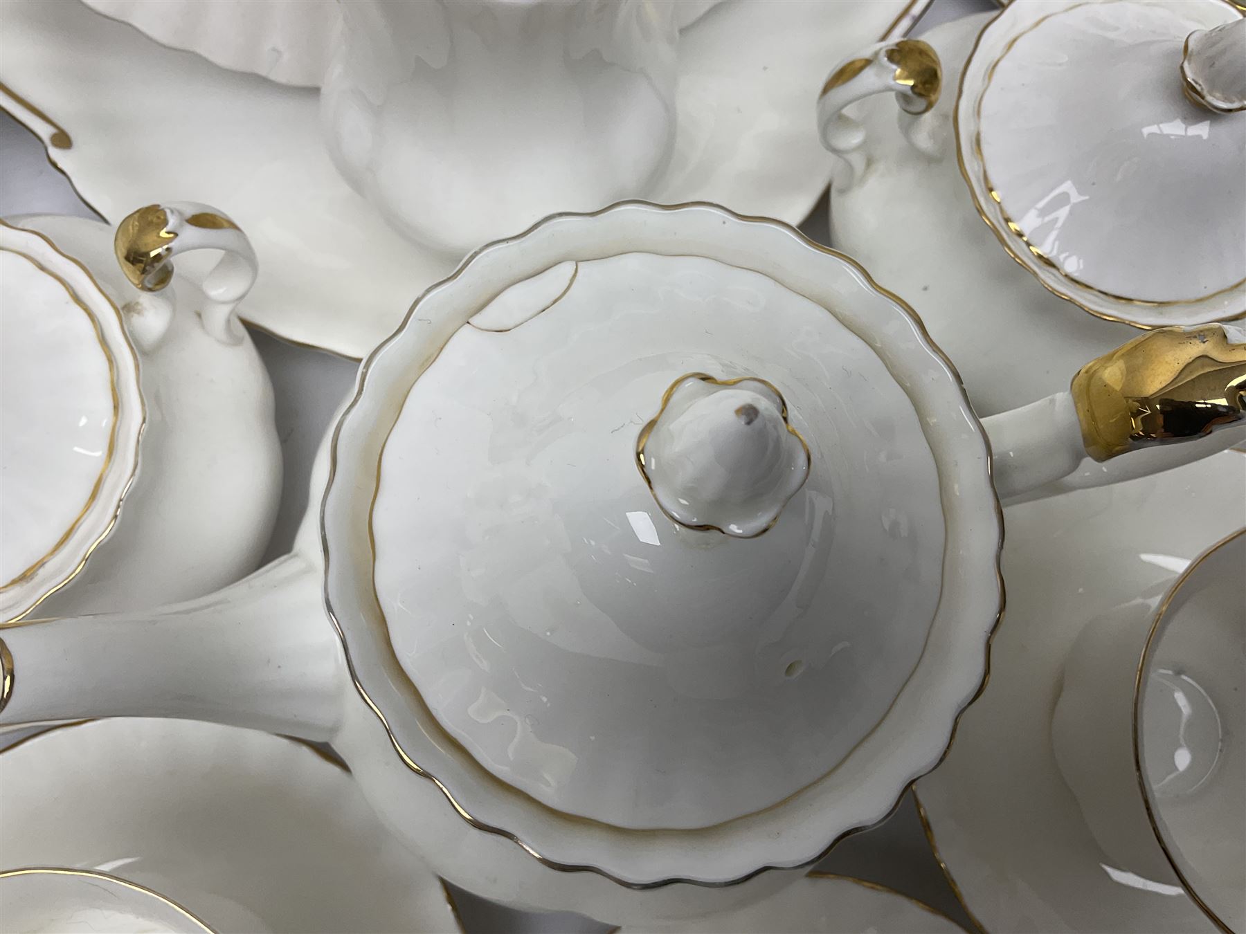 Royal Albert Val D'or pattern tea service for six, comprising teapot, milk jug, sucrier, six teacups and saucers, tea plates, side plates, dessert plates, etc (33)