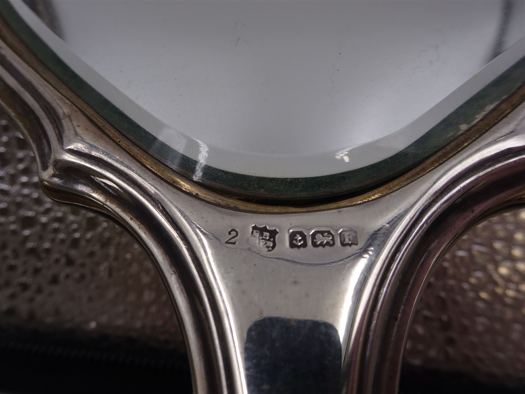 Art Deco five piece green guilloche enamel silver dressing table set, comprising hand mirror, two hair brushes and two clothes brushes hallmarked Barker Brothers Silver Ltd, Birmingham 1930, together with another silver brush, hallmarked Davis, Moss & Co, Birmingham 1928 (6)