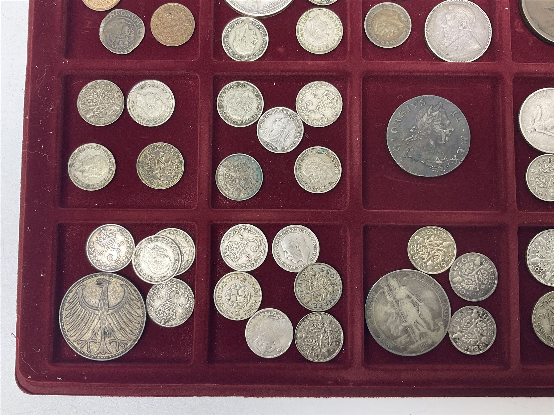 Great British and World coins including King George V 1935 crown, various silver three pence pieces, United States of America 1944 quarter dollar etc, housed in a coin tray