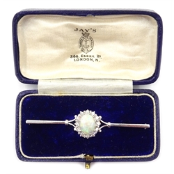  18ct white gold opal and diamond cluster bar brooch by B&S, Birmingham 1980  
