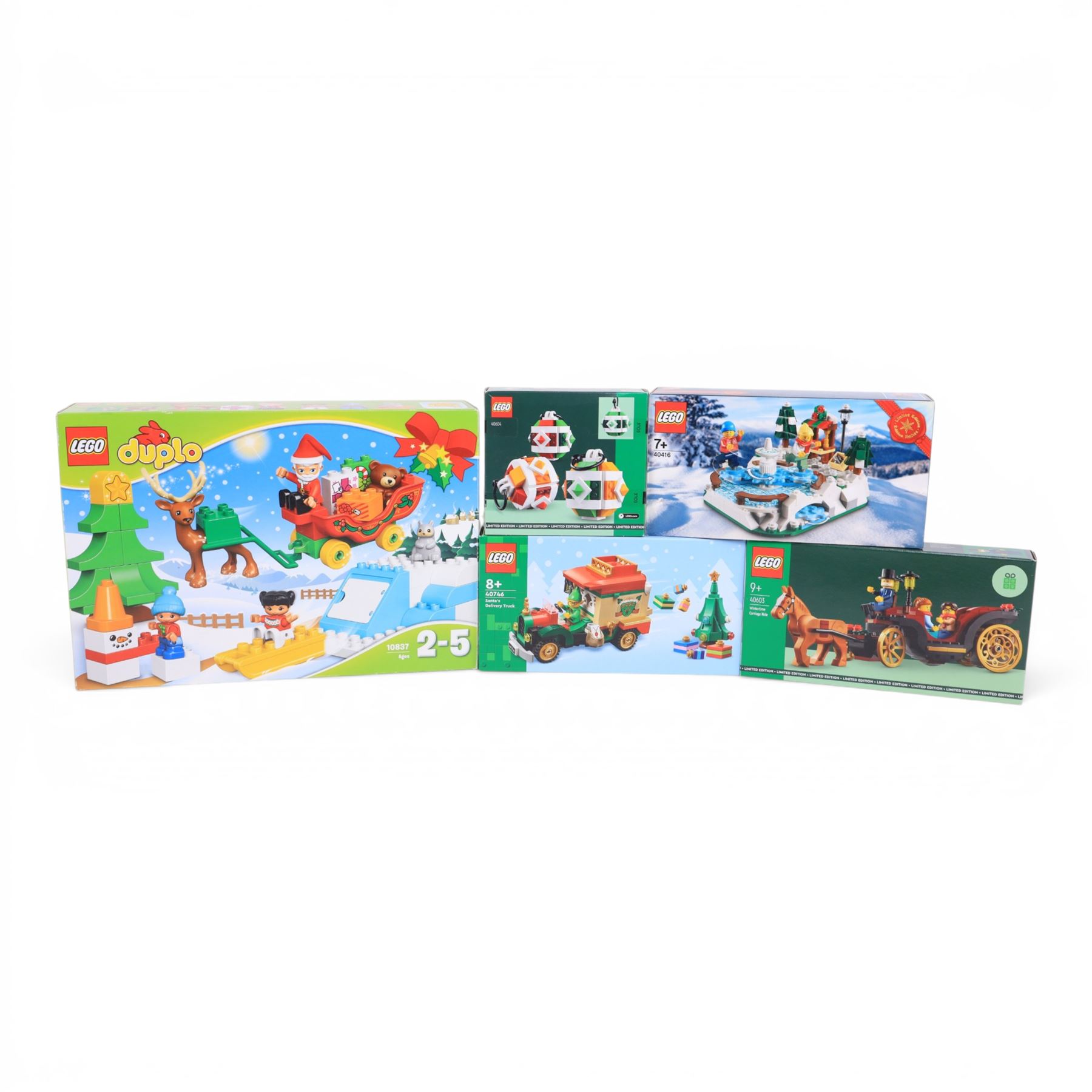 Five Lego sets, comprising Duplo Santa's Winter Holiday no. 10837, Christmas Decor Set no. 40604, Wintertime Carriage Ride no. 40603, Santa's Delivery Truck no. 40746 and Ice Skating Rink no. 40416, all boxed