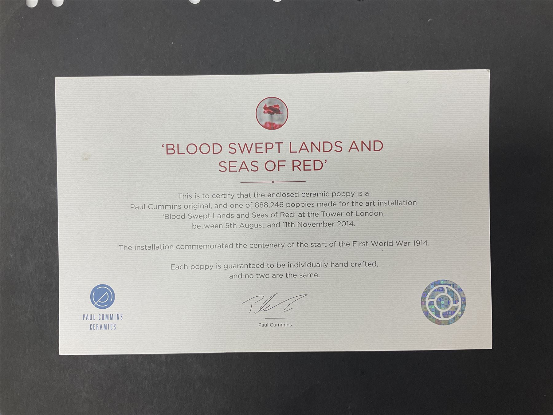 Paul Cummins (b 1977) ceramic poppy from the poppy art installation 'Blood Swept Lands and Seas of Red' at the tower of London with certification of authenticity