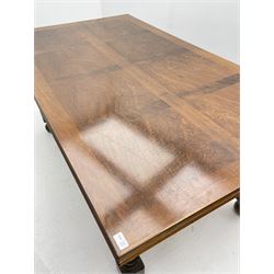 Late 20th century walnut drawer leaf extending dining table, shaped apron, on barley twist supports joined by stretchers