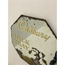 Octagonal wall hanging mirror, decorated with cream Cadbury's Milk Tray lettering and floral scene, W48cm