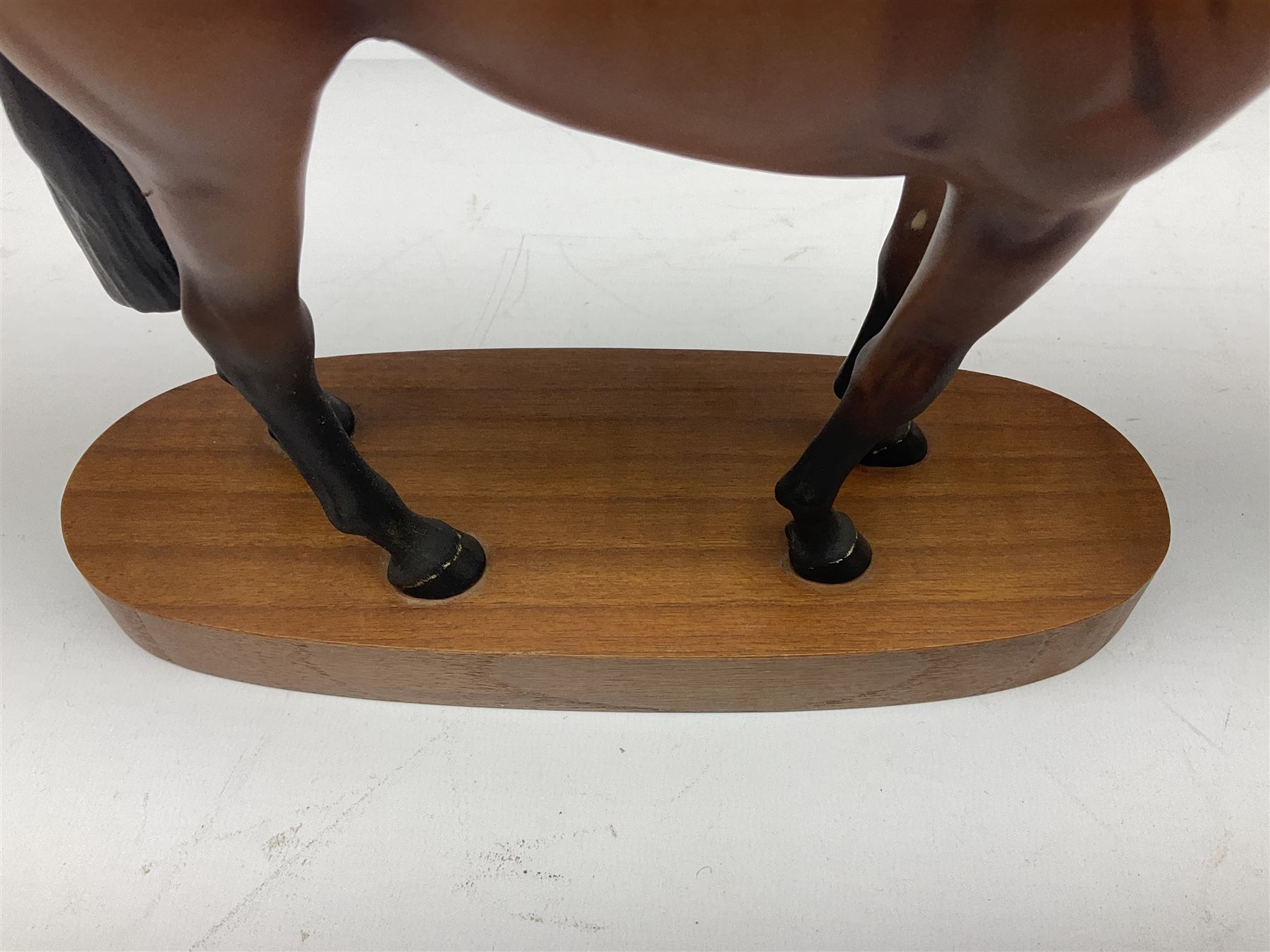 Beswick 'Mill Reef' horse figure, on a wooden plinth together with Beswick Ware horse figure 'Red Rum' on wood plinth, both with printed mark beneath