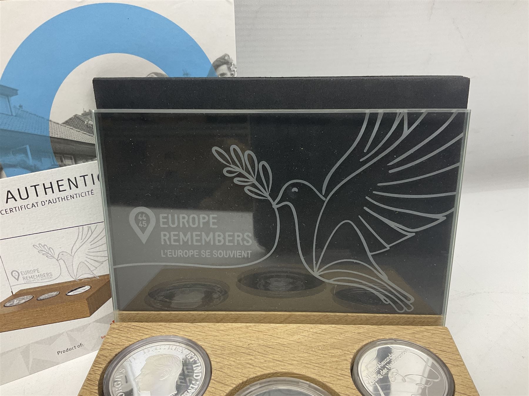 Royal Dutch Mint 'Europe Remembers' silver three coin set, comprised of Royal Canadian Mint 2020 one dollar '75th Anniversary of V-E Day', The Royal Mint 2020 one pound '75th Anniversary of VE Day' and Royal Dutch Mint 2020 five euros '75 Years of Freedom', cased with certificate