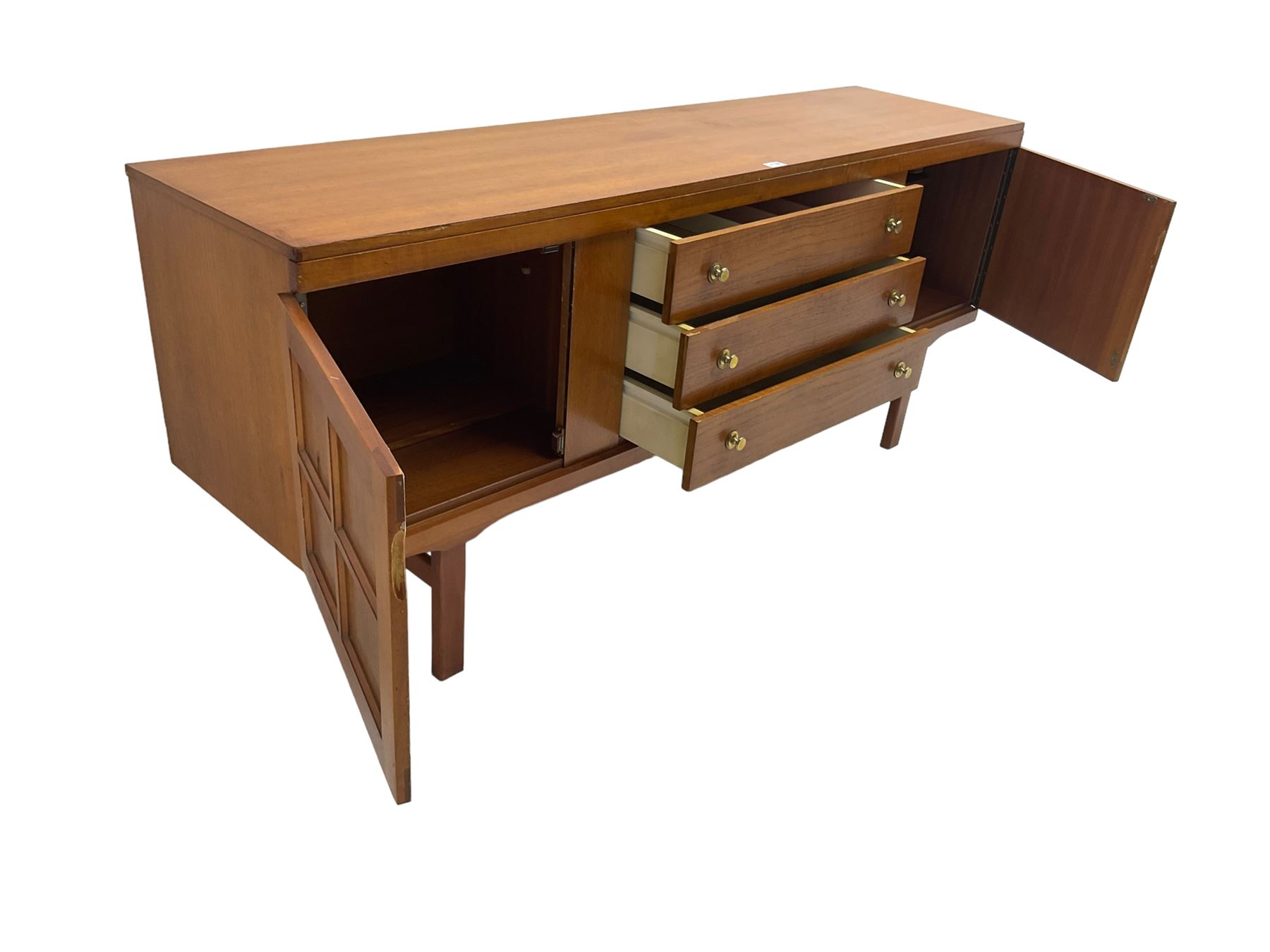 Elliotts of Newbury (EoN) - mid-20th century teak sideboard, fitted with three central drawers flanked by two cupboards, raised on square supports 