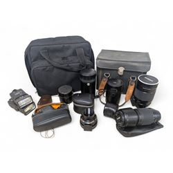 Kodak Dakon II folding camera and a collection of camera lenses and accessories, including...