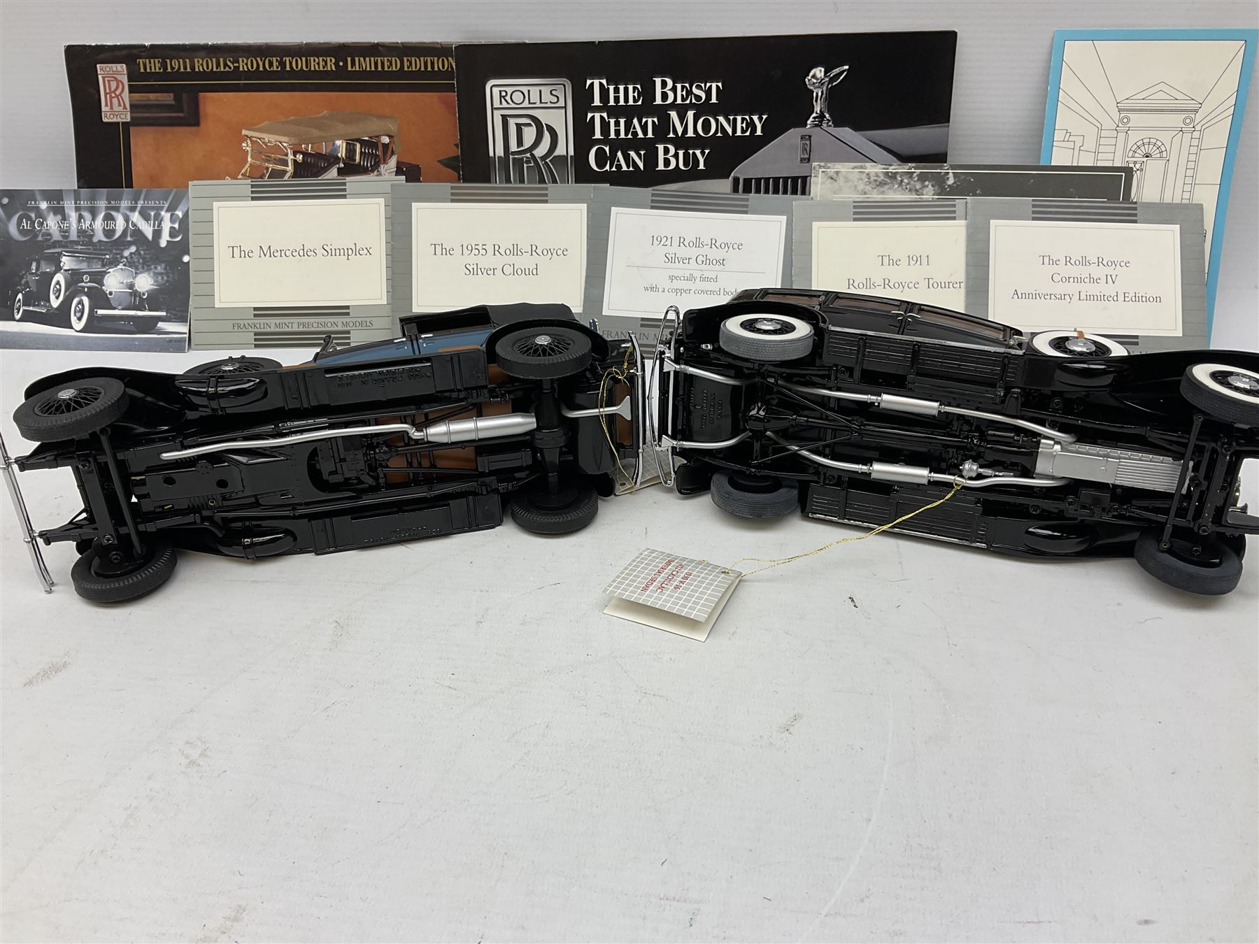Eight Franklin Mint diecast models of cars, 1911 Rolls-Royce Tourer, The Rolls-Royce Corniche IV, The Mercedes Simplex, 1955 Rolls-Royce Silver Cloud, 1921 Rolls-Royce Silver Ghost, 1907 Rolls-Royce Silver ghost,1929 Rolls-Royce Phantom I,  and 1930 V-16 452 Cadillac Imperial Sedan, all with original tags attached