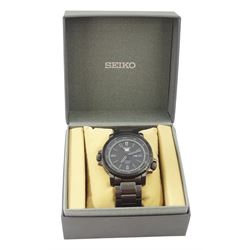 Seiko 5 Sports gentleman's stainless steel automatic wristwatch, Ref. 7S36-04N0, black dial with gilt baton hour markers and one other Seiko 5 Sports, Ref. 7S36-04X0, with grey dial and baton hour markers, both with day-date apertures and exhibition back cases, one boxed