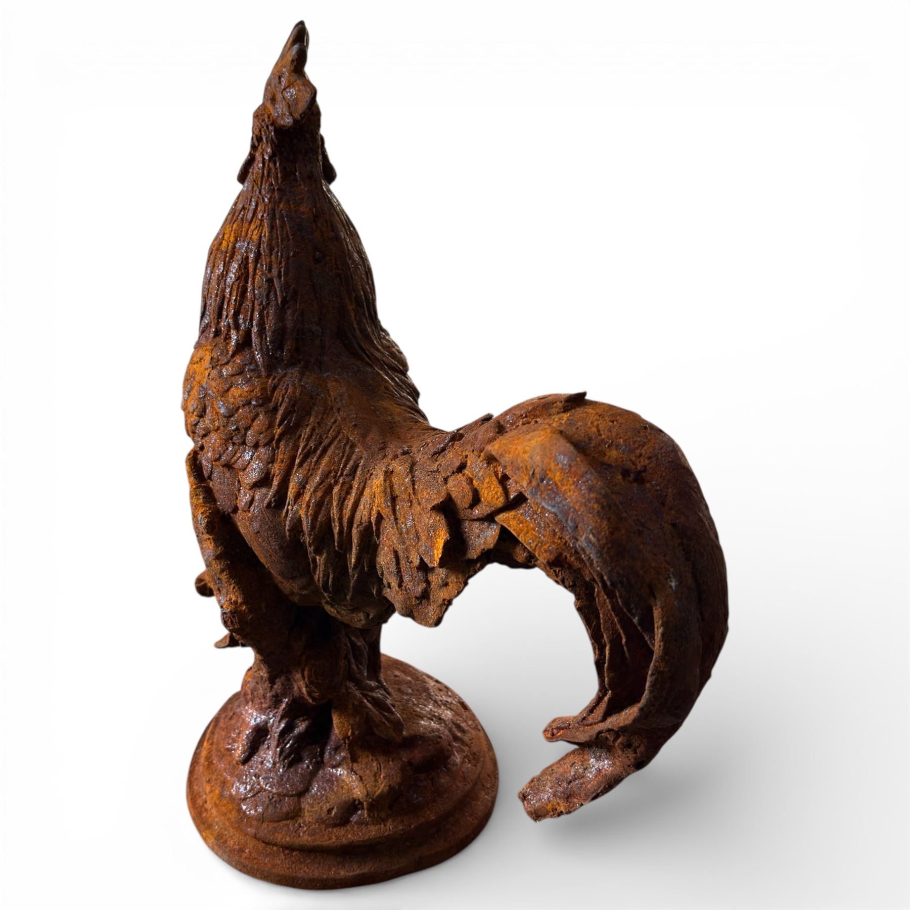 Small cast iron cockerell, on circular base