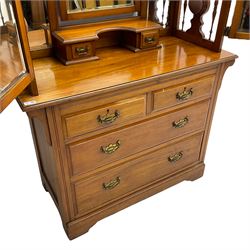 Edwardian satin walnut dressing chest, raised triple swing mirror back with trinket drawers, two short and two long drawers