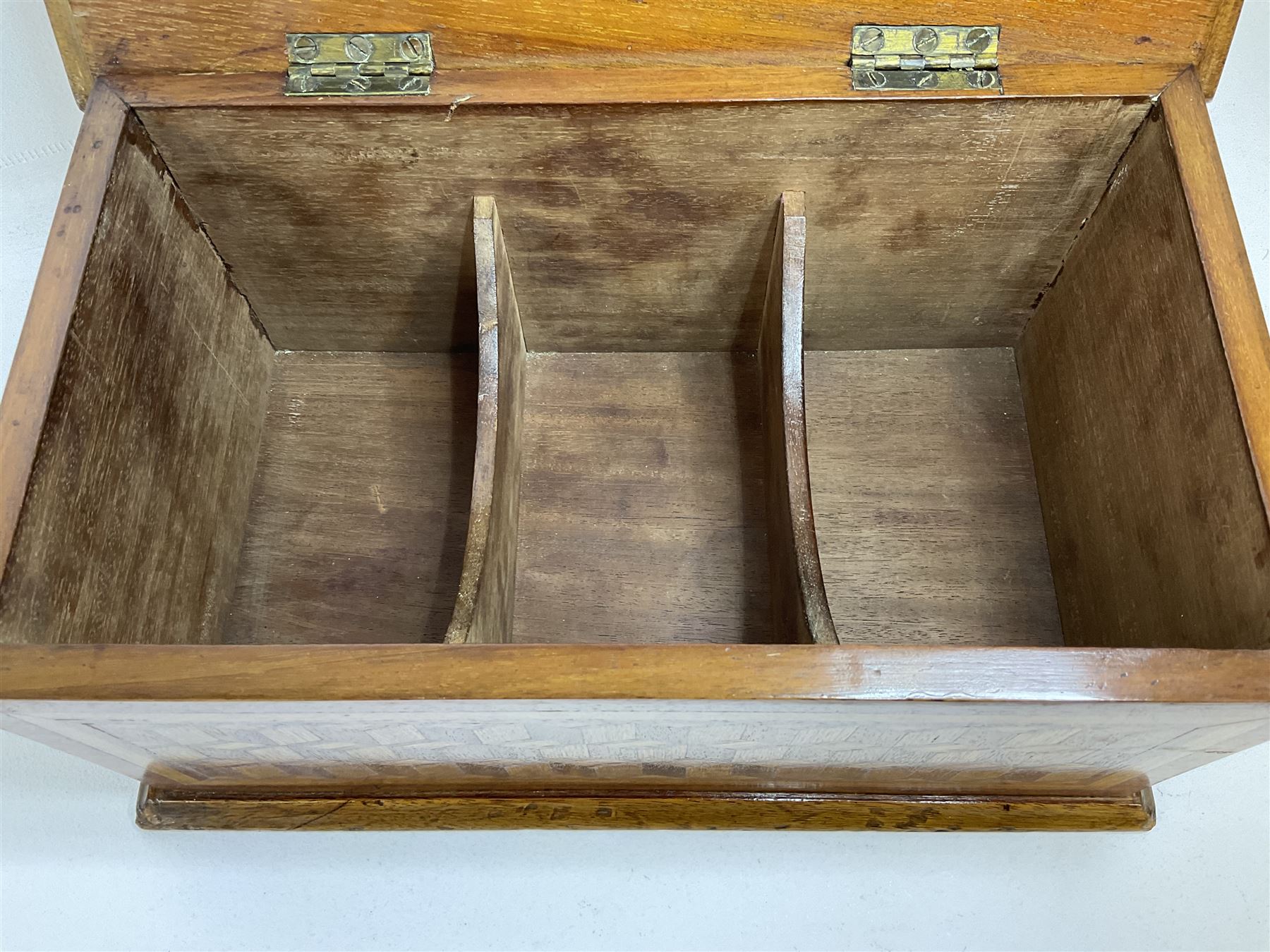 19th Century mahogany and parquetry box of rectangular form, geometric cube design, with a stylised sun detail to the hinged cover, opening to reveal three compartments, L33cm D21cm H16cm
