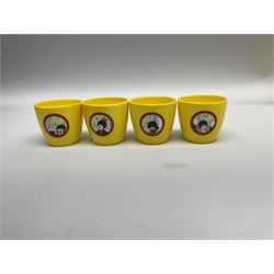 Limited edition Beatles Yellow Submarine teapot, designed by Paul Smith and made for Thomas Goode, 4/200, together with matching egg cups, 25/200, both in original boxes. 