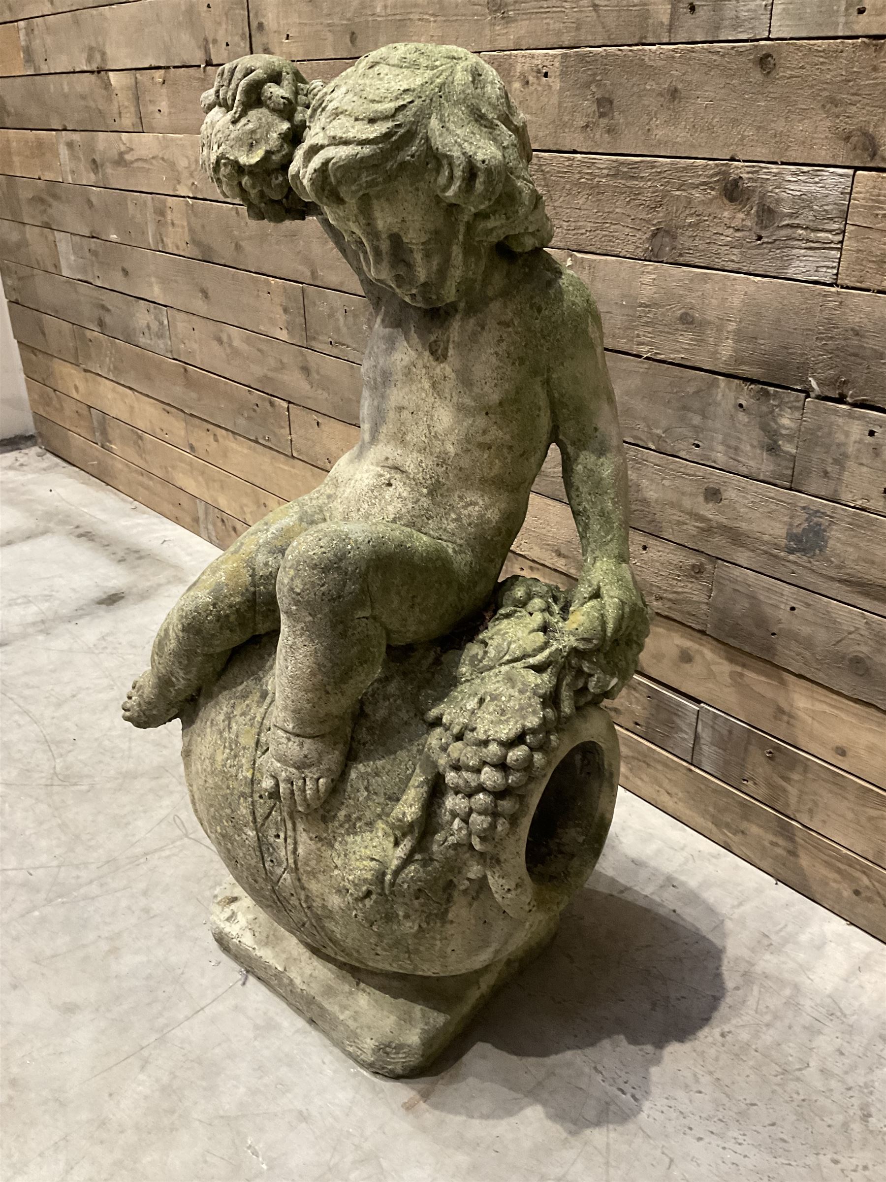 Cast stone garden figure - grape carrier on barrel