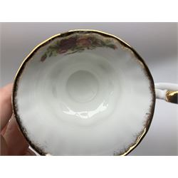 Royal Albert Old Country Roses pattern tea set, comprising teapot, coffee pot, six teacups and six saucers, five side plates, further teacup with joined saucer and side plate, open sucrier, milk jug, cake plate, and preserve pot and cover, together with Royal Albert Jubilee Rose pattern sauce boat and stand, and Royal Albert Lavender Rose pattern cake stand. 